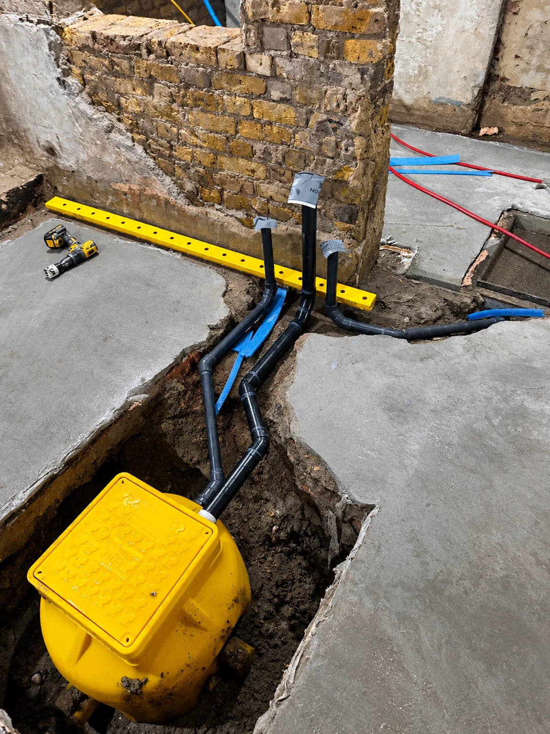 Pump chamber pipework and drainage connections during installation